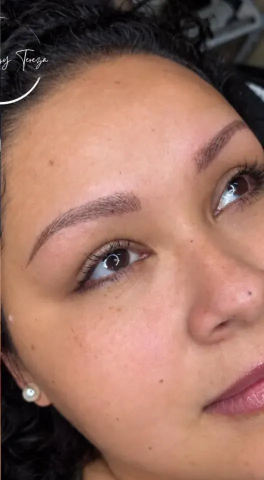After: full, natural microbladed brows with soft hair strokes